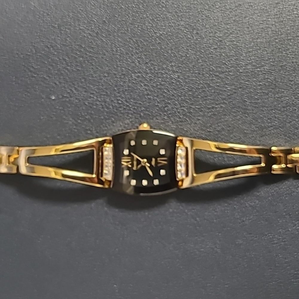 Armitron Now-Swiss Movement Gold Tone Watch -New Battery